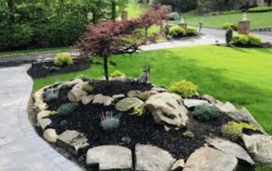 Professional garden landscaping with custom design in Kalamazoo, MI by Kristen Properties