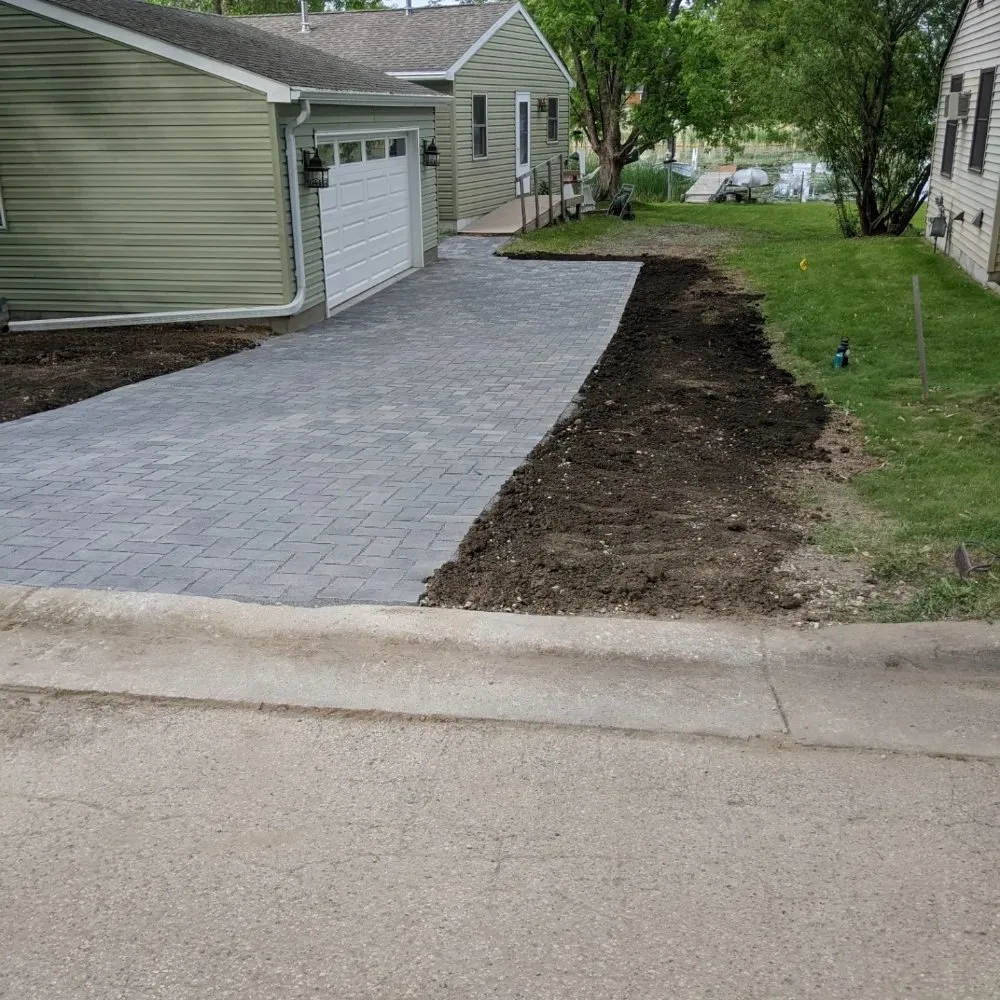 Professional lawn care service in Maplewood, MN by Kroschel's Real Estate & Landscaping