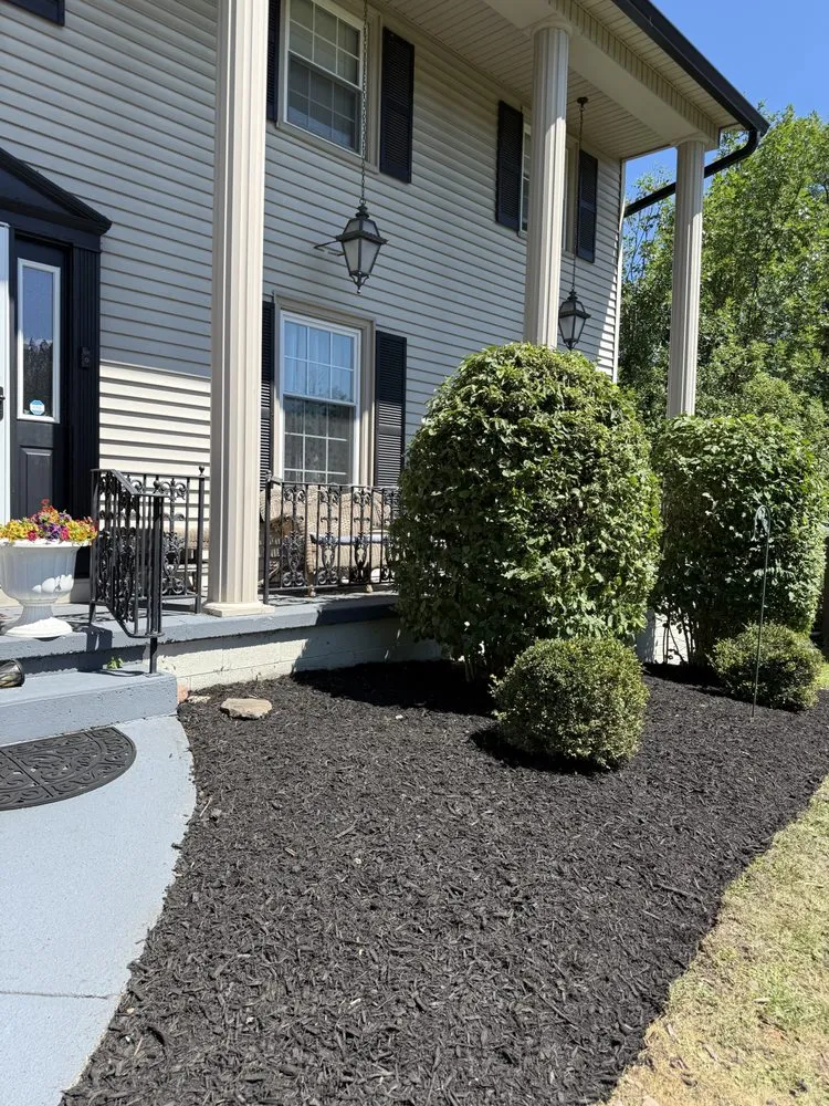 Custom landscaping services with custom design in Brockport, NY by Krug’s property services