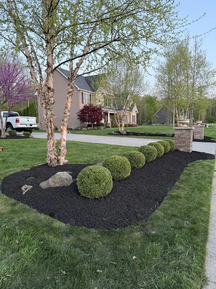 Custom residential landscaping for beautiful yards in Brockport, NY by Krug’s property services