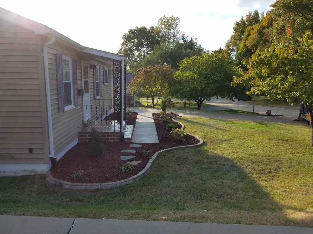 Expert lawn mowing service with custom design in Ofallon, MO by K&S Lawn Maintenance