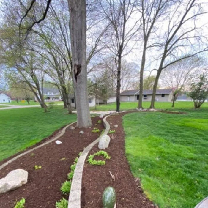 Custom yard cleanup service for year-round maintenance in Magnolia, IL by Kuehn Lawn Services