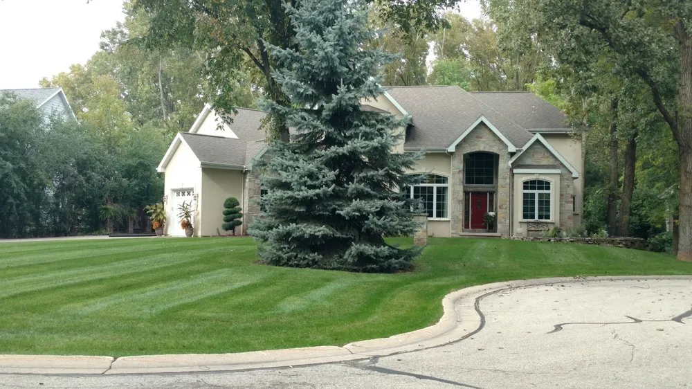 Reliable lawn mowing service experts serving New London, WI - Kuether Services