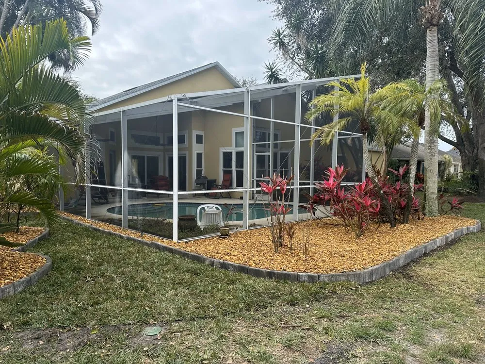 Affordable lawn mowing service for residential properties in Rockledge, FL by Kustom Kreations Landscaping