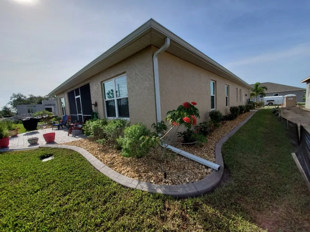 Affordable residential landscaping in Port Charlotte, FL by Kustomized Kurbing