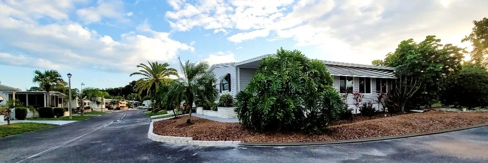 Affordable yard cleanup service in Port Charlotte, FL by Kustomized Kurbing
