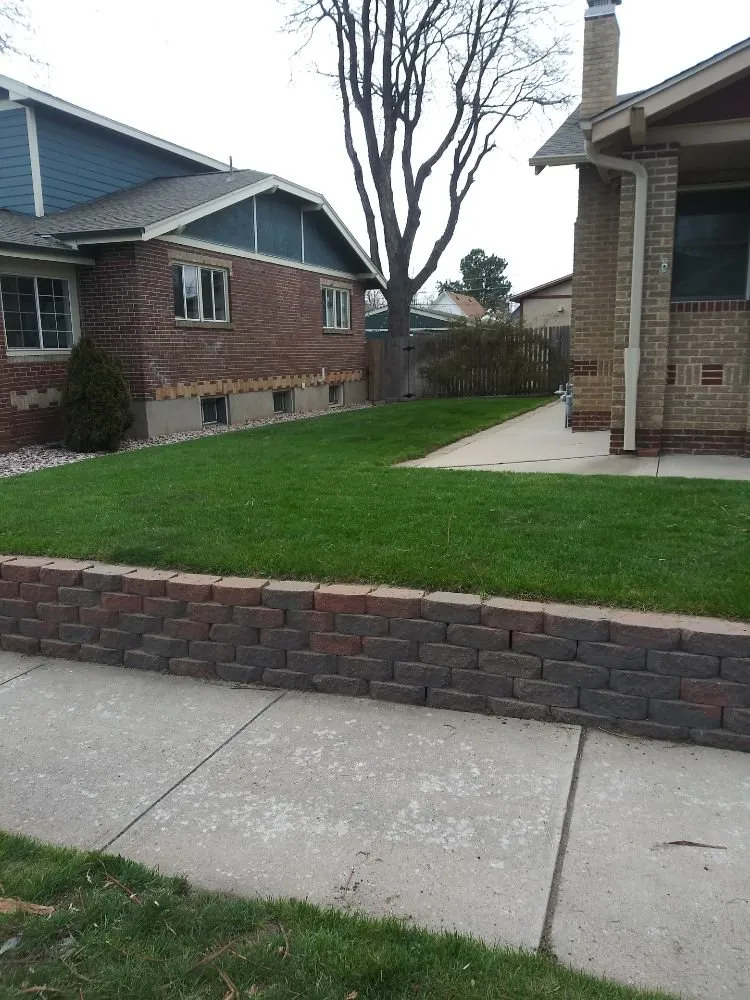 Expert lawn mowing service with custom design in Denver, CO by Kut-N-Krew Lawn Care
