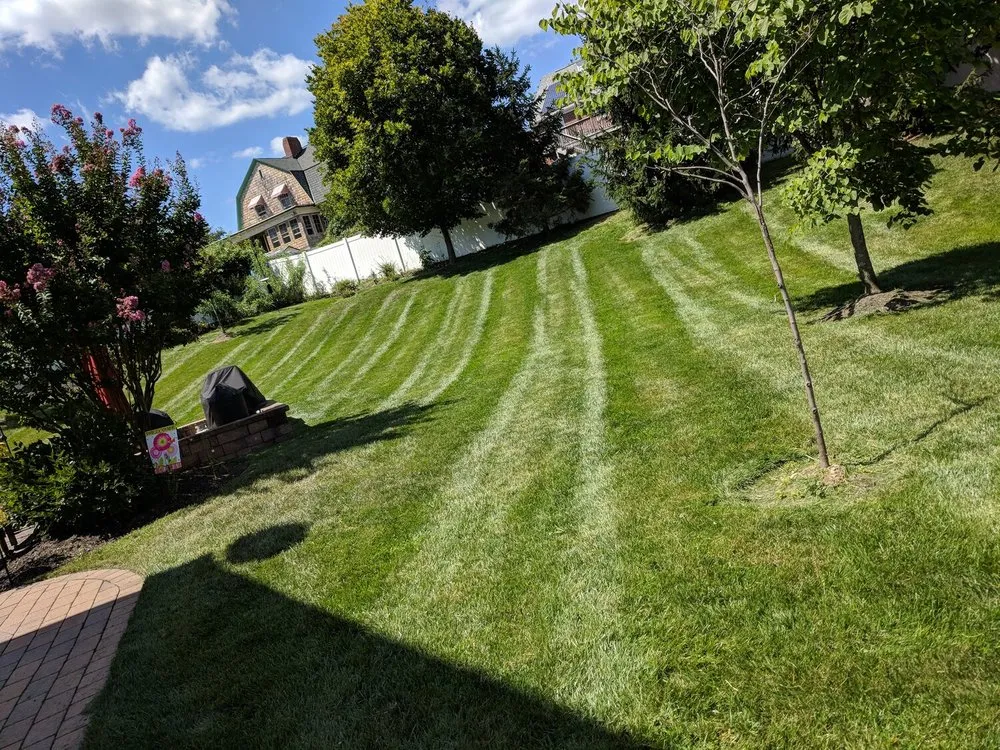 Trusted lawn mowing service for beautiful yards in Plattsburgh, NY by KW Lawn Care & Snow Removal