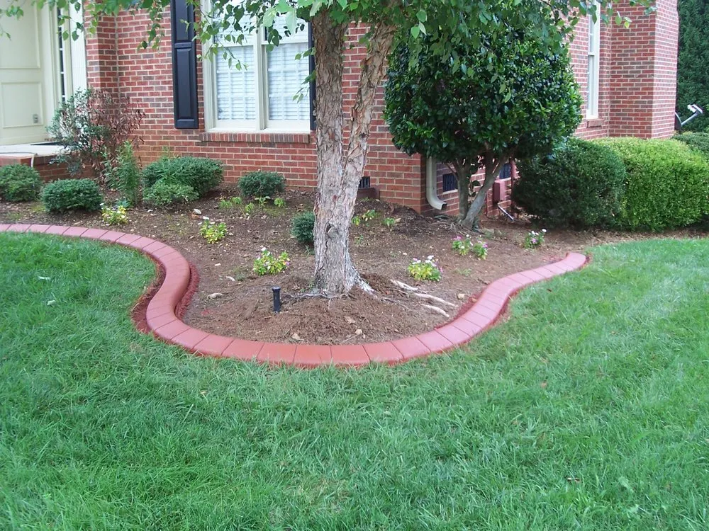 Custom landscape design with custom design across Duncan, SC - Kwik Kerb