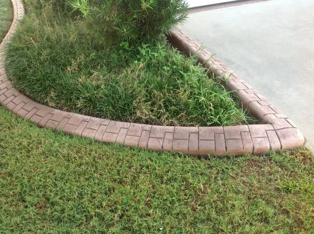 Custom outdoor landscaping with custom design in Duncan, SC by Kwik Kerb