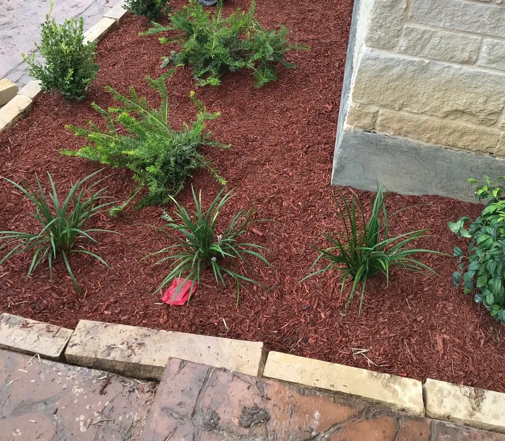 Expert garden landscaping for beautiful yards in Dallas, TX by Kylon Tree & Lawn Service