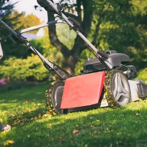 Custom landscape installation with custom design in Coal Valley, IL by Kymbyl Komplete Kare