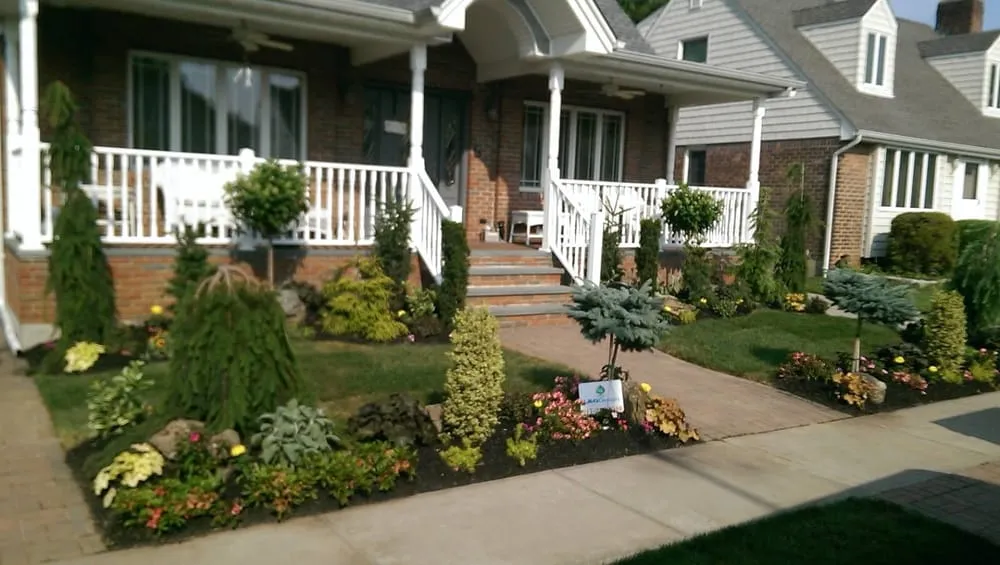 Custom outdoor landscaping for residential properties across Queens, NY - L & G Design Corp