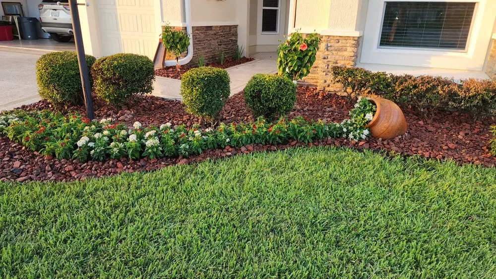Professional lawn mowing service for outdoor upgrades in Orlando, FL by L & J Landscape Design and Maintenance