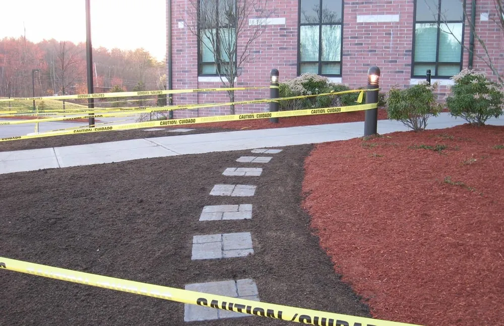 Custom yard cleanup service for homes in Raynham, MA by L & K Lawn Care Inc. landscaping and lawn maintenance