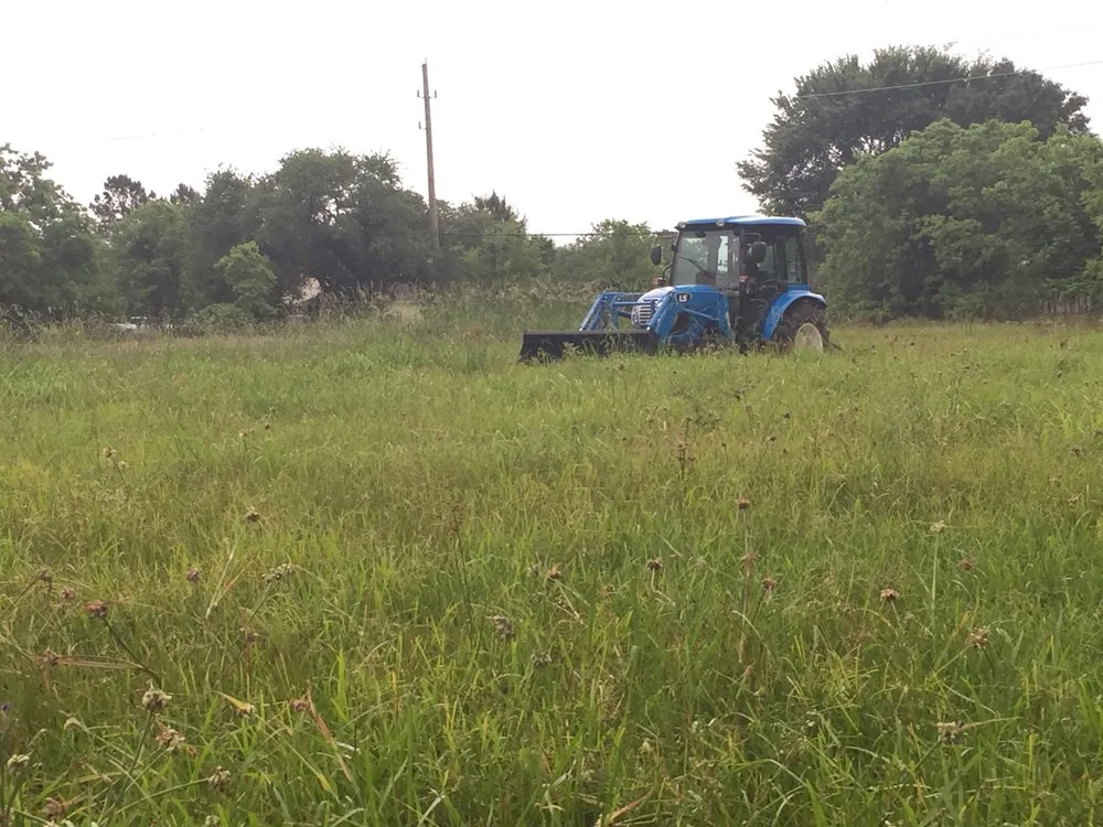 Affordable lawn mowing service near you in Santa Fe, TX by L & M Tractor Services