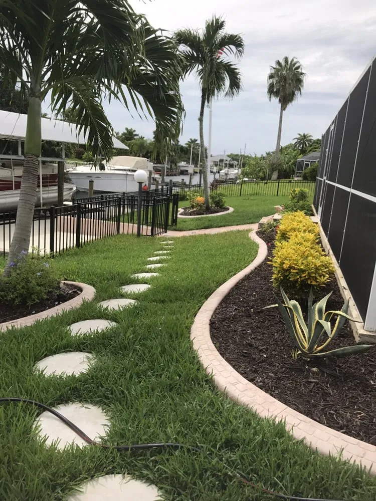Affordable lawn care service for year-round maintenance in Cape Coral, FL by L J Decorating Landscape
