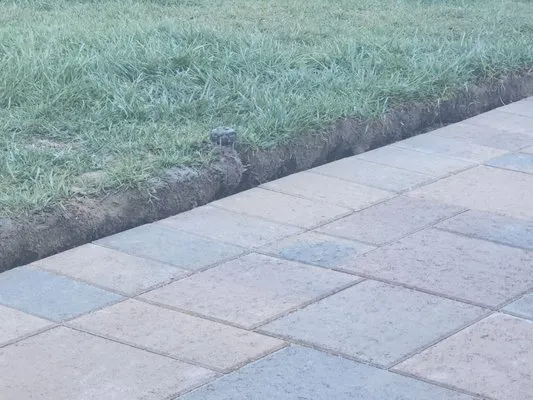 L. Raymond's Landscaping & Construction Logo