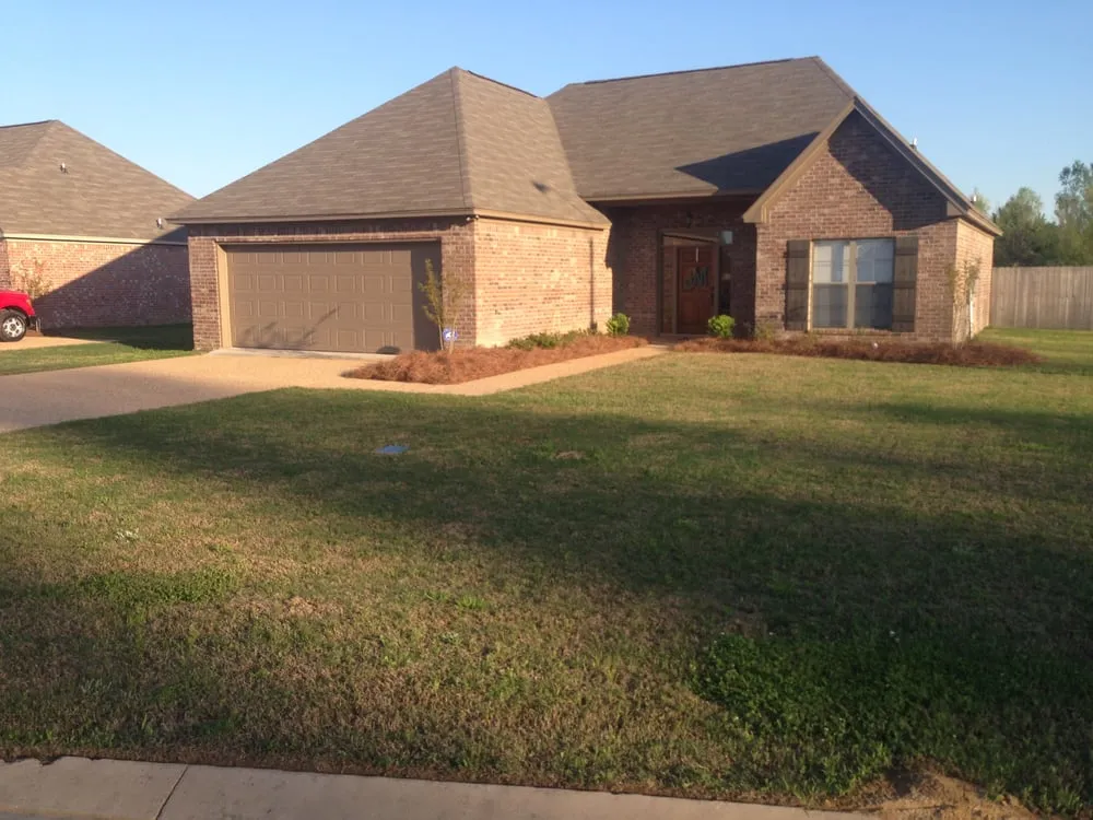Professional residential landscaping with custom design in Madison, MS by L Smith Lawn Service
