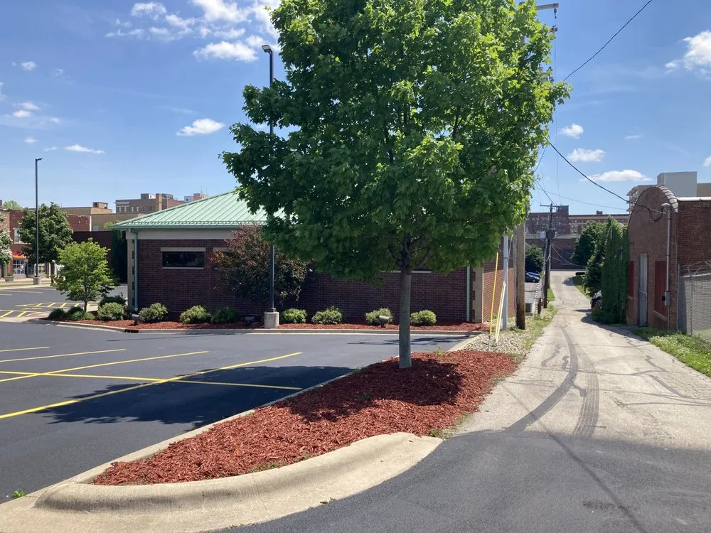 Custom lawn care service for year-round maintenance across Decatur, IL - L Squared Aesthetics