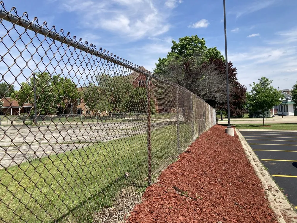 Affordable lawn mowing service for year-round maintenance in Decatur, IL by L Squared Aesthetics