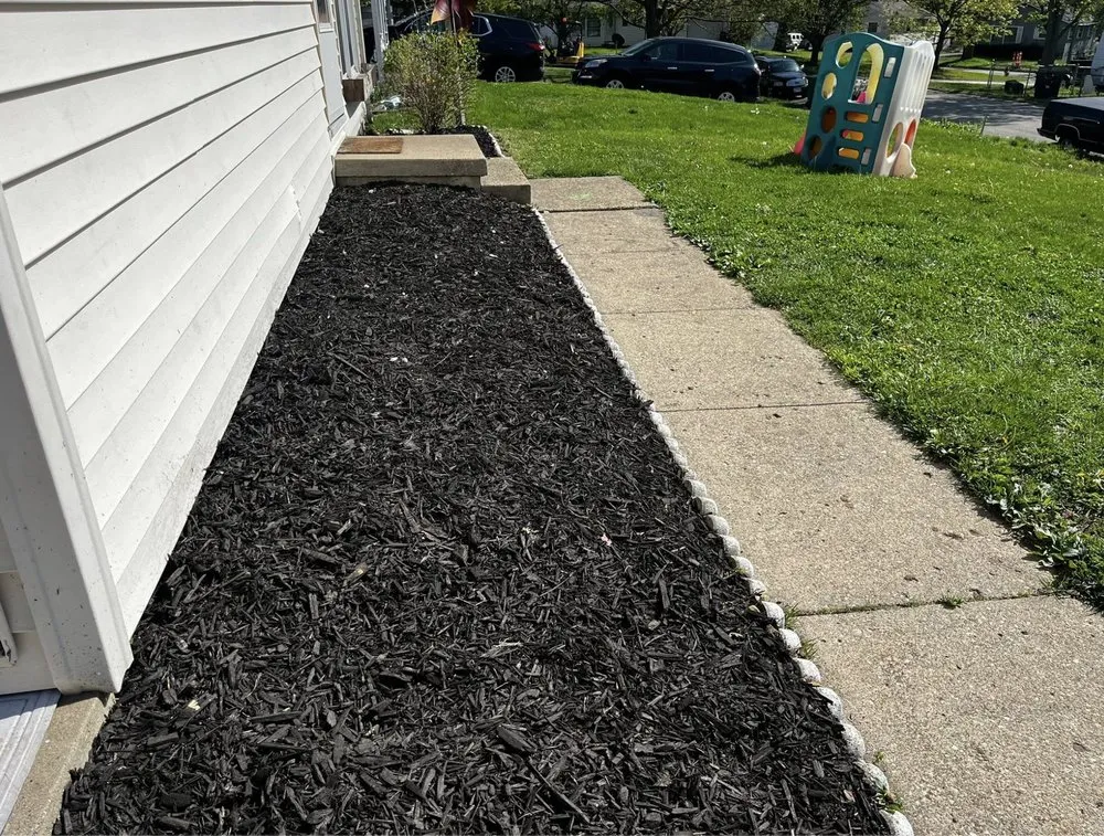 Custom yard cleanup service for outdoor upgrades in Decatur, IL by L Squared Aesthetics