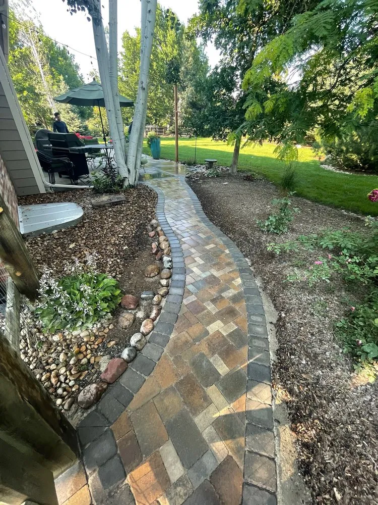 Local lawn mowing service for residential properties in Northglenn, CO by L Vision