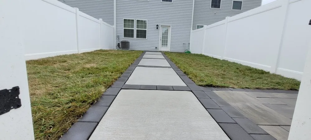 Affordable lawn mowing service for residential properties in Camden, NJ by L&A Hardscaping and Landscaping