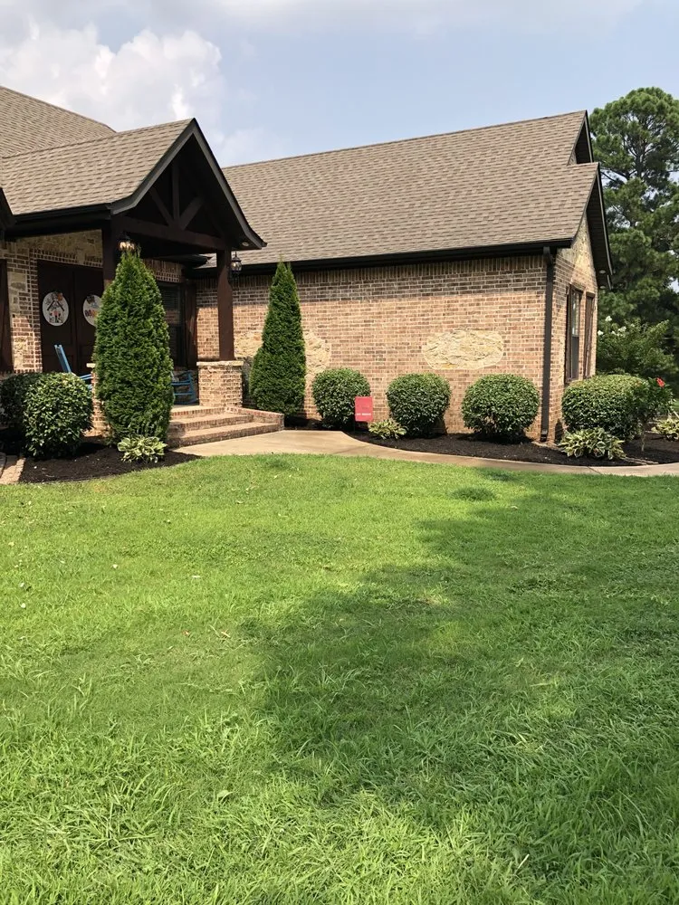Custom outdoor landscaping with custom design in Paragould, AR by Lacey Lawn and Construction