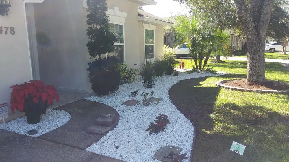 Custom landscape installation with custom design in Jacksonville, FL by Ladycat's Lawns, Landscaping and More