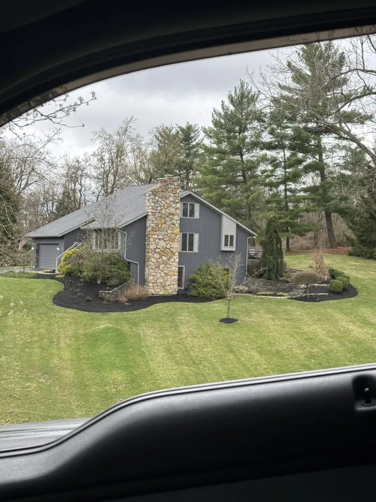 Custom yard cleanup service for year-round maintenance in Cincinnati, OH by Laib Land and Lawn