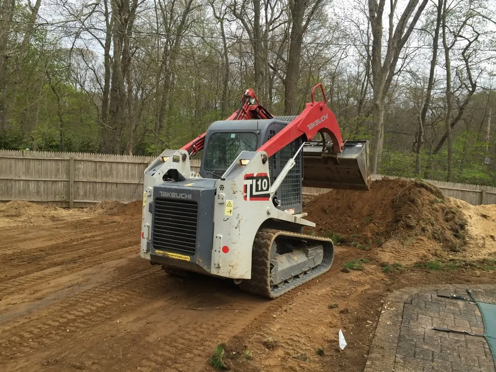 Custom yard maintenance for year-round maintenance in Smithtown, NY by Lake Norman Long Island Excavating