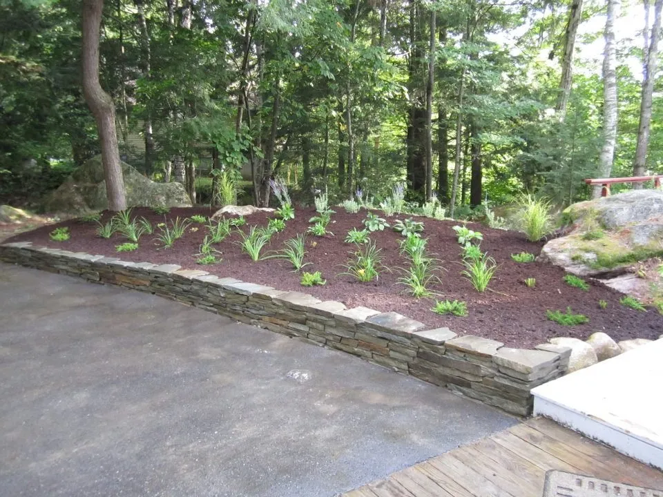 Affordable lawn mowing service with custom design in Belgrade, ME by Lakeside Landscape