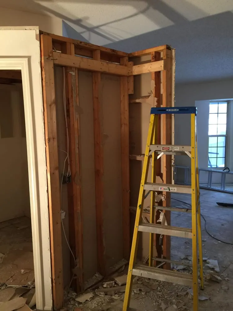 Professional yard cleanup service for homes in Brighton, MI by Lamanen Construction