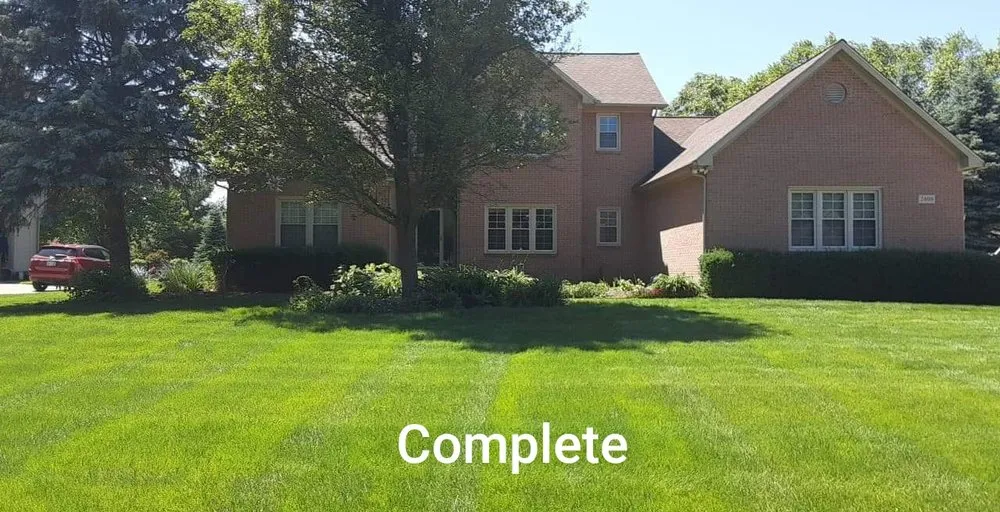 Professional lawn mowing service for year-round maintenance in Highland, MI by Lambert's Landscaping & Tree Removal