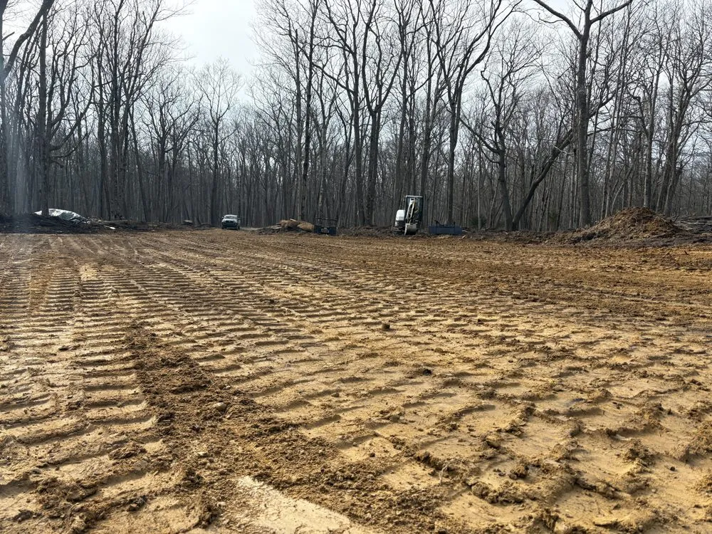 Affordable landscape installation with custom design in Indian Lake, PA by Land And Lumber Excavation