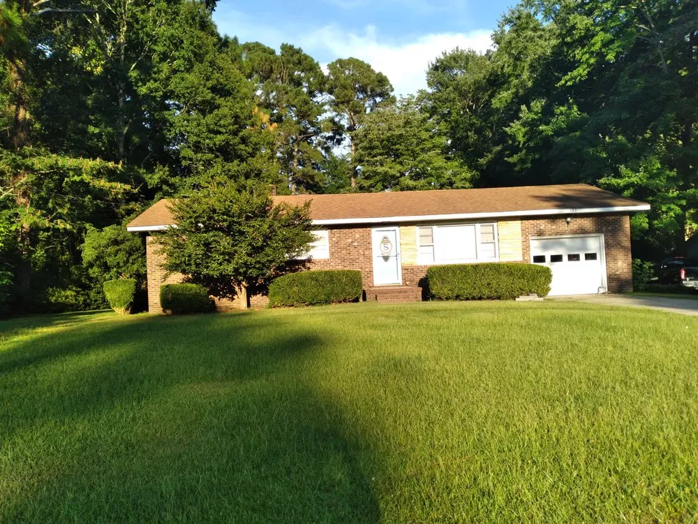 Affordable garden landscaping for year-round maintenance in Jacksonville, NC by Land Care Property Maintenance & Lawn Care