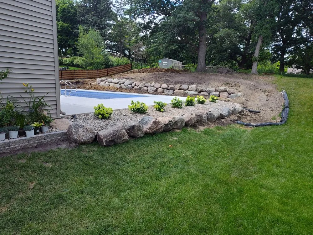 Affordable lawn mowing service for outdoor upgrades across Mound, MN - Land Construction Solutions