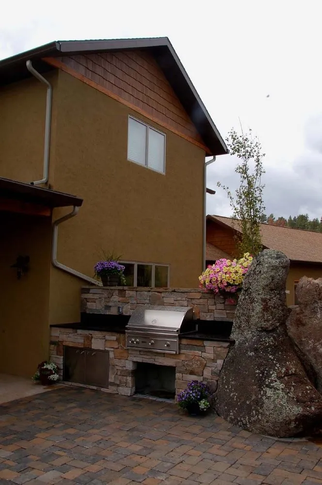 Affordable lawn care service for homes across Bozeman, MT - Land-Escapes