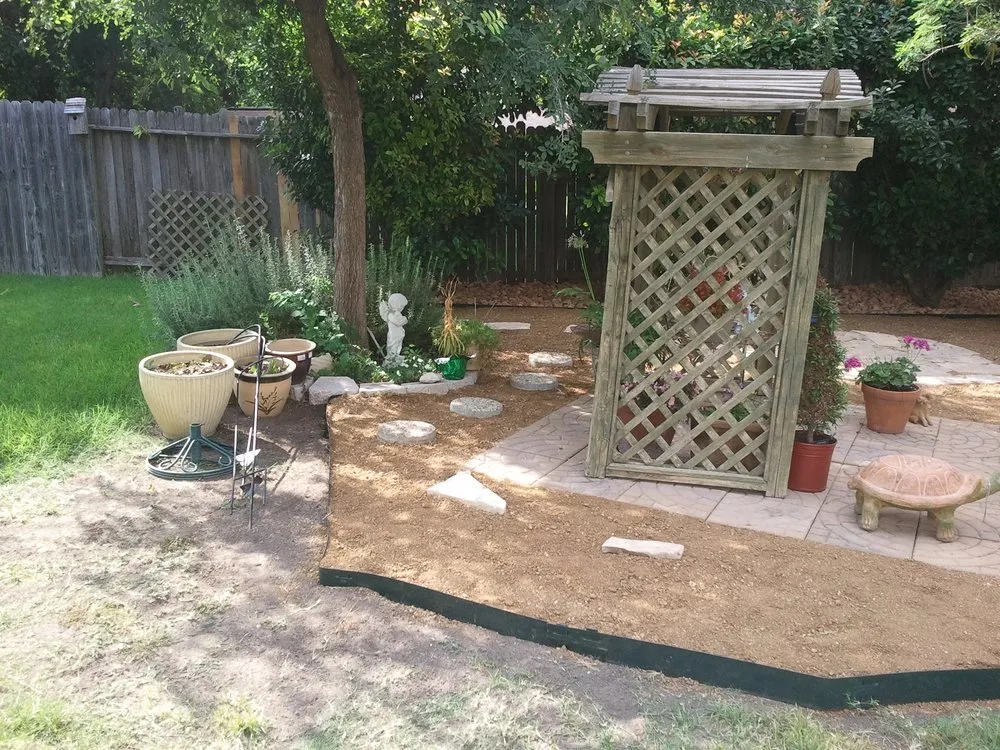 Professional landscape installation in Helotes, TX by Land-N-Lawns