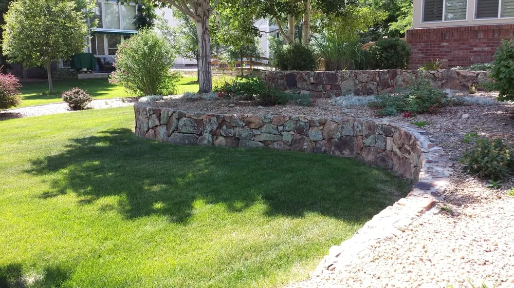 Affordable lawn mowing service in Denver, CO by Land of Green