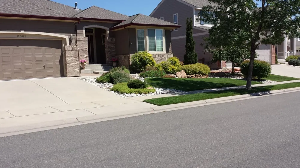 Custom residential landscaping for residential properties in Denver, CO by Land of Green
