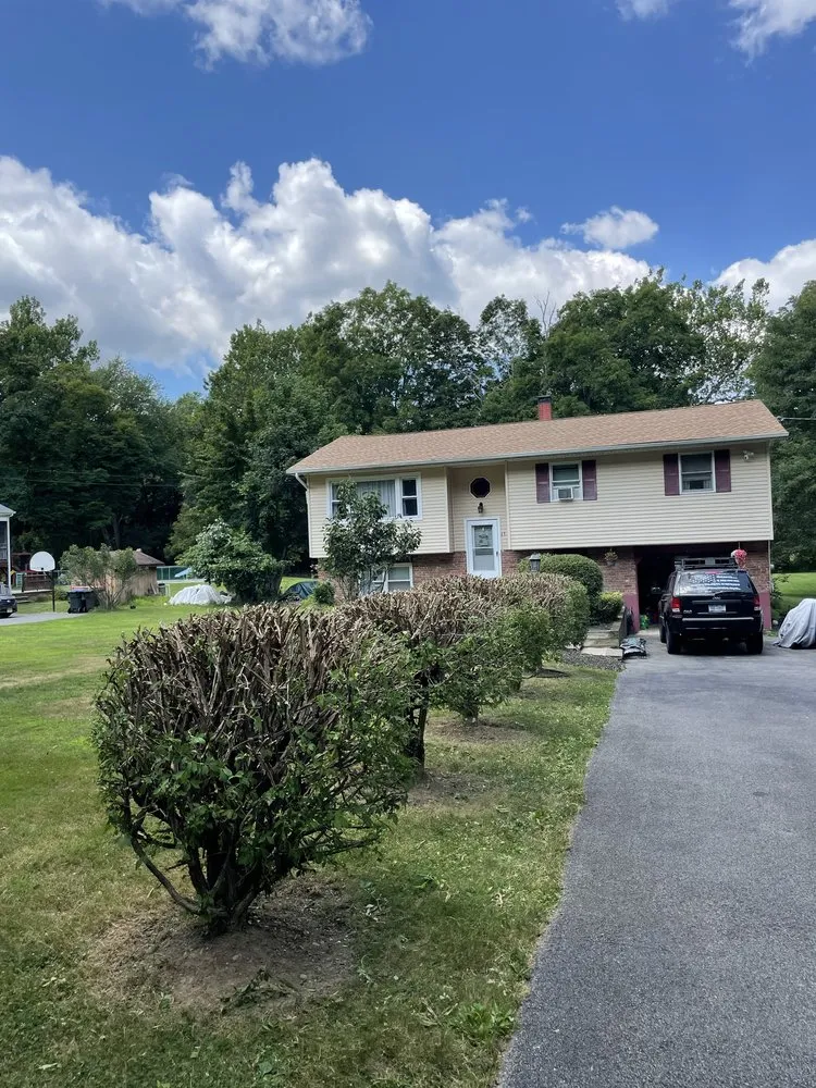 Custom outdoor landscaping in Bloomingburg, NY by Land Wow