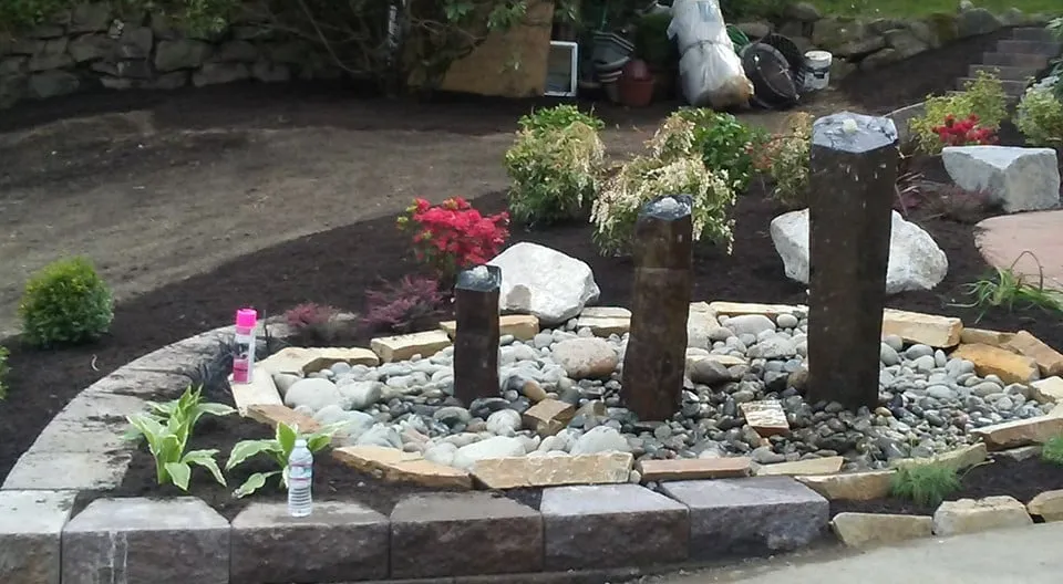 Affordable lawn care service for year-round maintenance in Redmond, WA by Landcos Construction Services