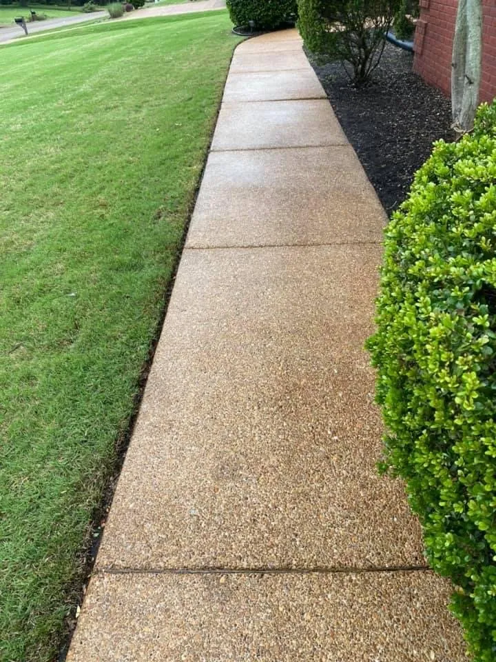 Custom lawn mowing service for residential properties in Jackson, TN by Landers Lawn Service