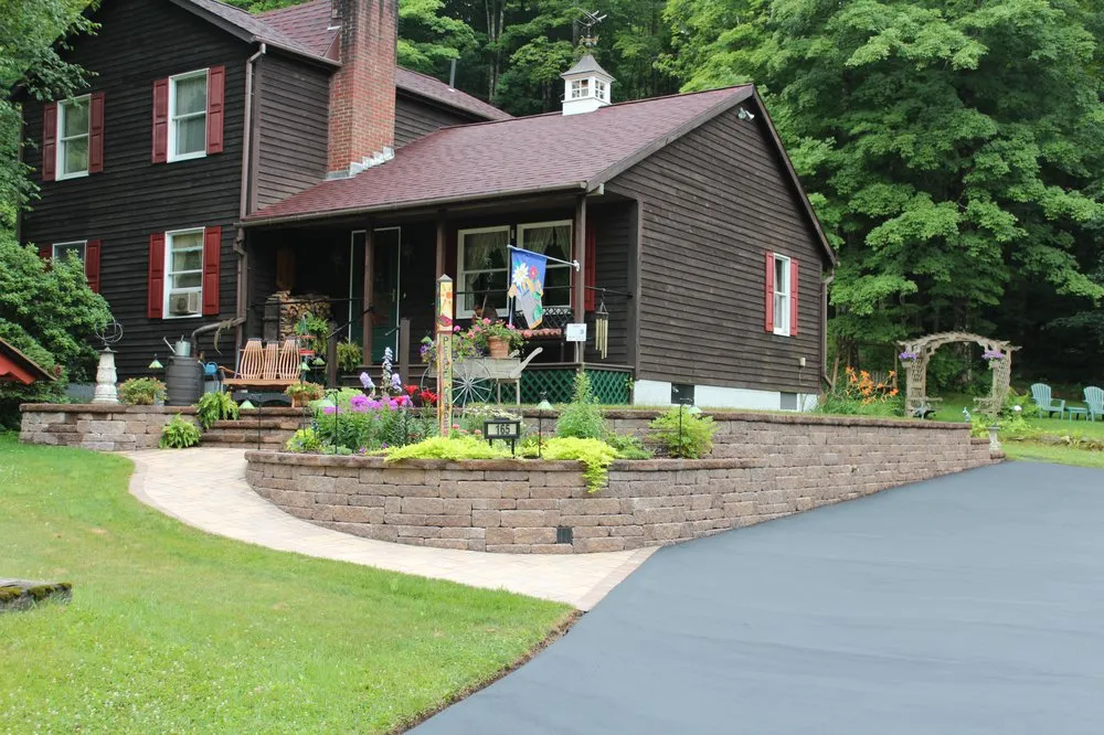 Custom garden landscaping with custom design in Glenville, NY by Landmark Design & Installation