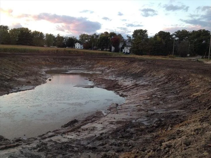 Custom lawn mowing service with custom design in Stoughton, WI by Landmark Improvements