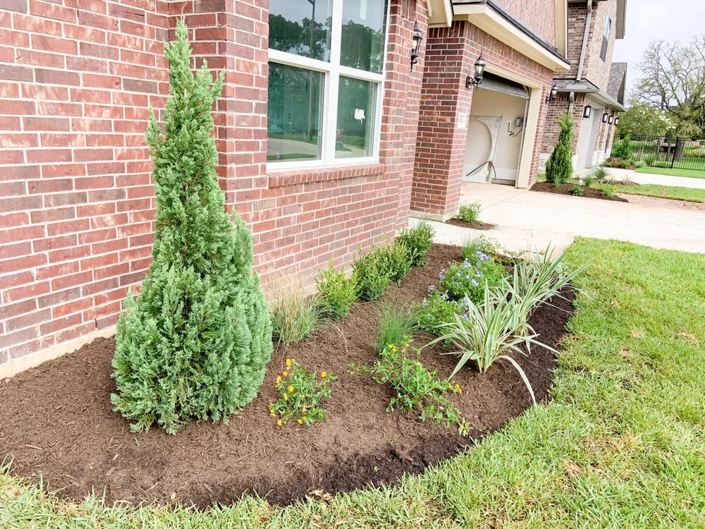 Local garden landscaping for residential properties in College Station, TX by Landmark Landscape Group