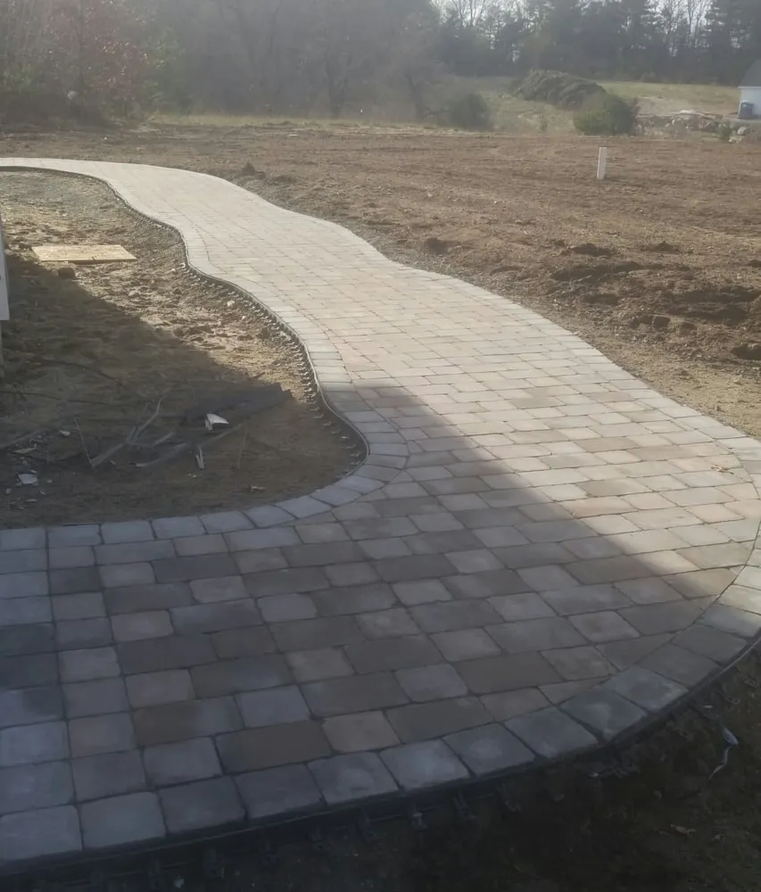 Professional yard maintenance for year-round maintenance across Attleboro, MA - Landry Landscaping