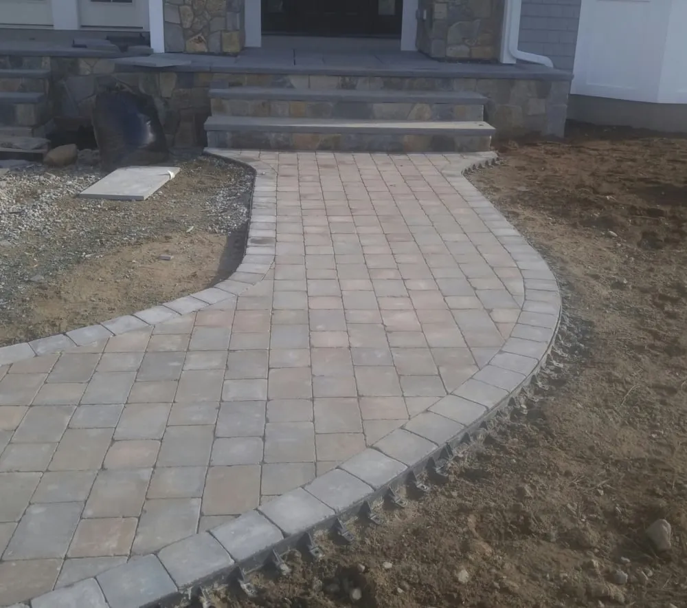 Custom landscaping services for year-round maintenance across Attleboro, MA - Landry Landscaping